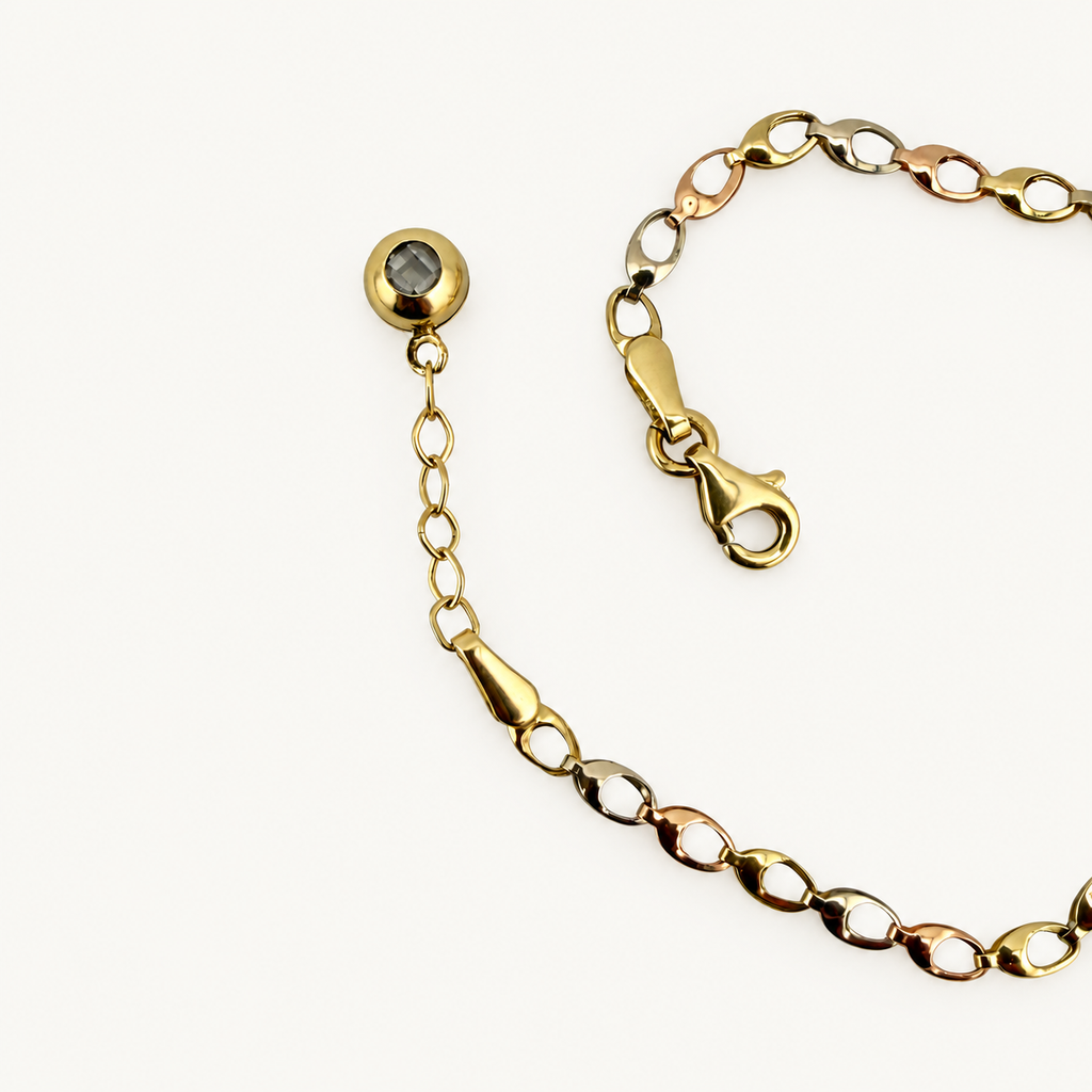 Three-motif link bracelet, clasp and extender detail